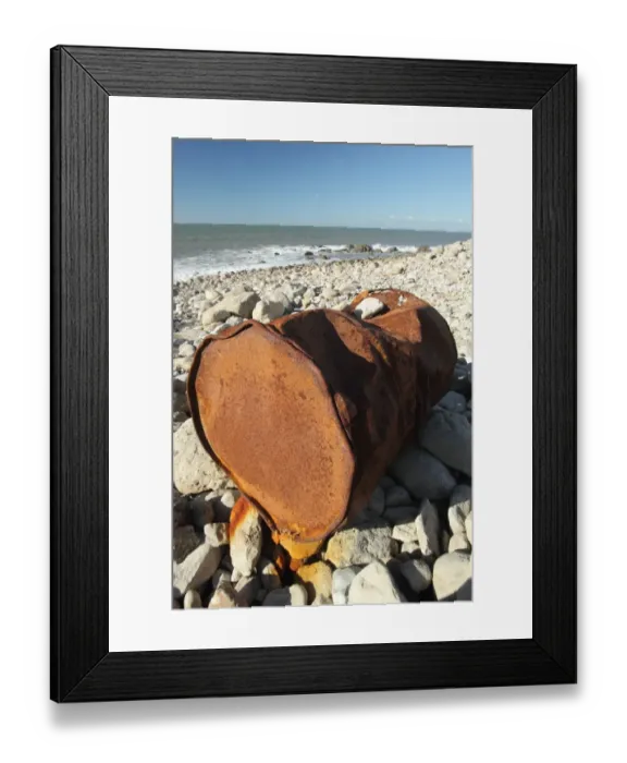 Framed Print : Rusty metal oil drum washed up on beach, Portland, Dorset, England, November Framed Print : Rusty metal oil drum washed up on beach, Portland, Dorset, England, November