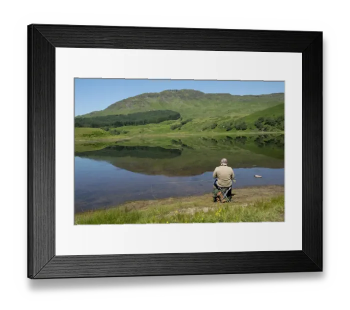 Framed Print : Angler sitting on shore of freshwater loch, Loch Lubhair, near Crianlarich, Trossachs, Stirling, Scotland, July Framed Print : Angler sitting on shore of freshwater loch, Loch Lubhair, near Crianlarich, Trossachs, Stirling, Scotland, July