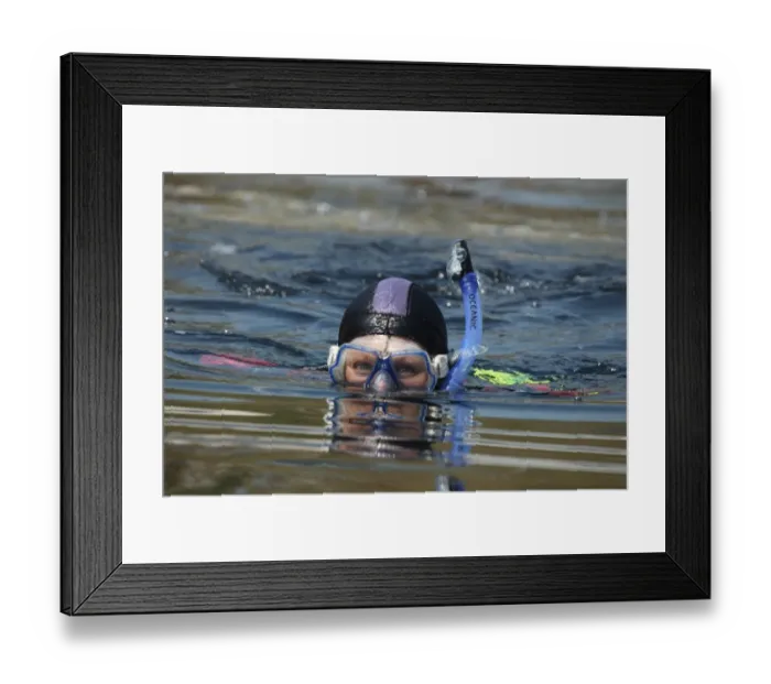 Framed Print : Woman snorkelling at surface of sea, Kimmeridge Bay, Isle of Purbeck, Dorset, England, July Framed Print : Woman snorkelling at surface of sea, Kimmeridge Bay, Isle of Purbeck, Dorset, England, July