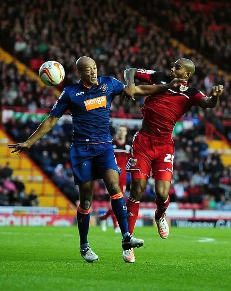 Bristol City vs Blackpool: Marvin Elliott vs Alex John-Baptiste Battle for Possession in Championship Match