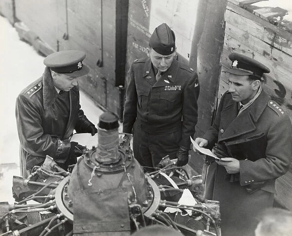 Two Czechoslavakian Officers and a USAF Officer Inspect ?
