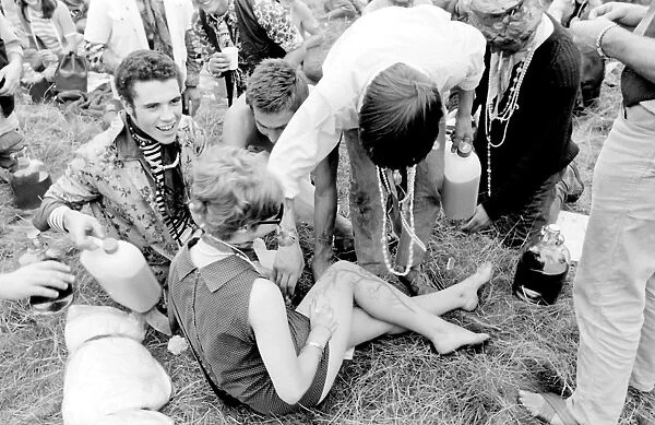 Hippies relaxing in a field at Woburn Park