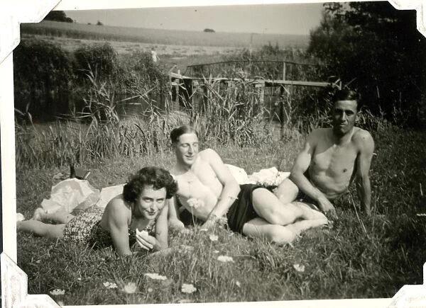 Three people relaxing, Lessingen, Germany, WW2