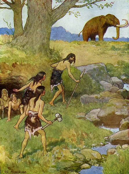 Prehistoric men hunting a mammoth in Britain