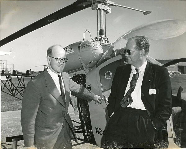 Robert Herbert Whitby with Jack Caulson alongside Bell 47