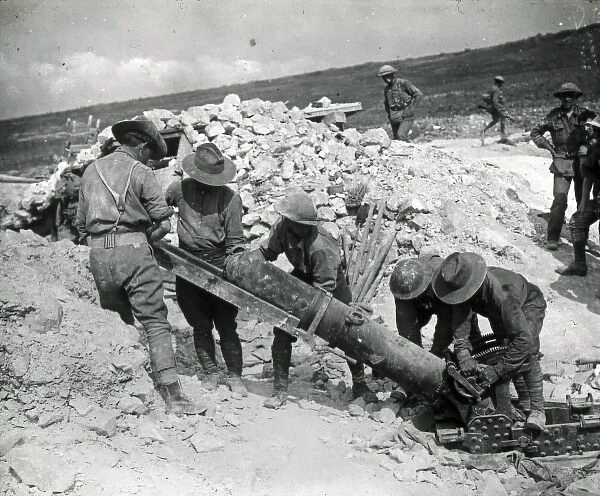 Soldiers loading a field gun