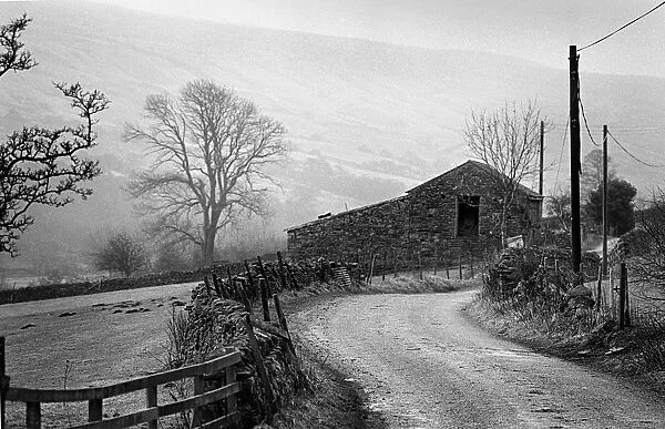 A stone barn on a farm down a country lane in Coverdale