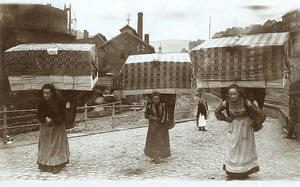 Women taking finished goods to market, Germany