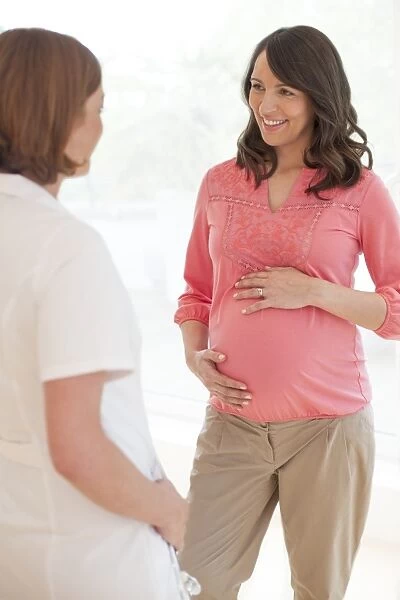Pregnant woman and nurse F008  /  2980