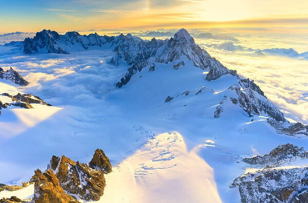 Aerial view of the Grand Jorasses at sunrise, Mont Blanc massif, Courmayeur, Aosta Valley