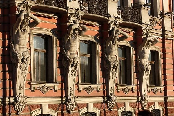 Atlantes holding up columns of Beloselsky-Belozersky Palace, St. Petersburg, Russia, Europe