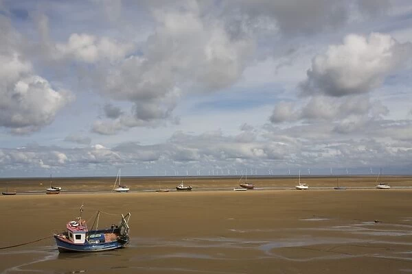 Boats on the beach near New Brighton, Wirral Peninsula, Merseyside, England, United Kingdom, Europe