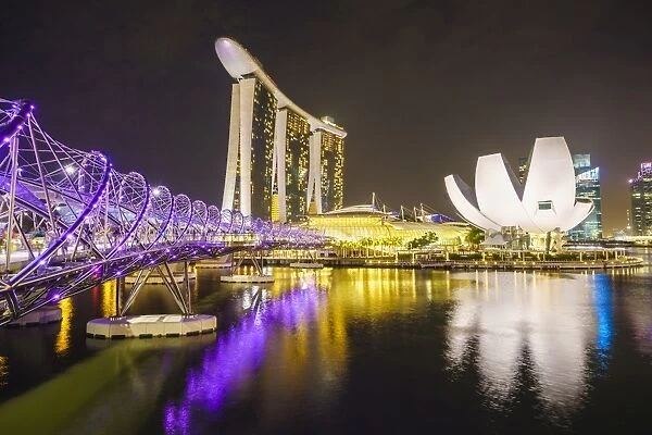 Helix Bridge, Marina Bay Sands and ArtScience Museum illuminated at night, Marina Bay