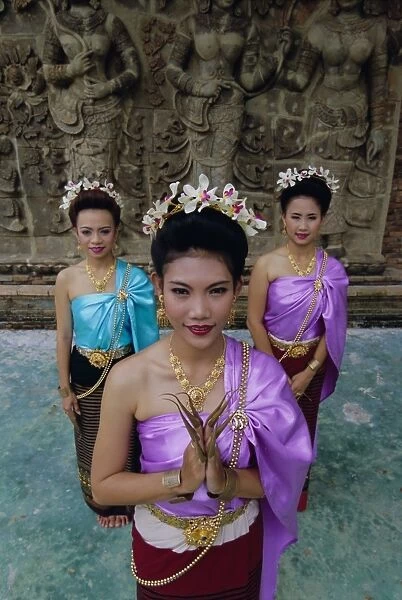 Portrait of three traditional Thai dancers