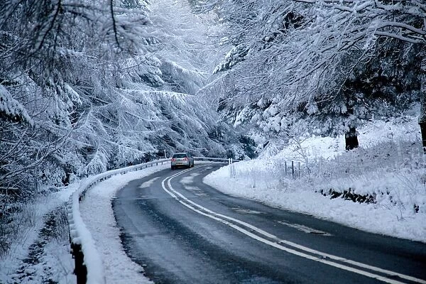 Road in snow, Peak District National Park, Derbyshire, England, United Kingdom, Europe