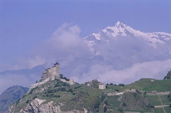 Valeria castle with mountains beyond