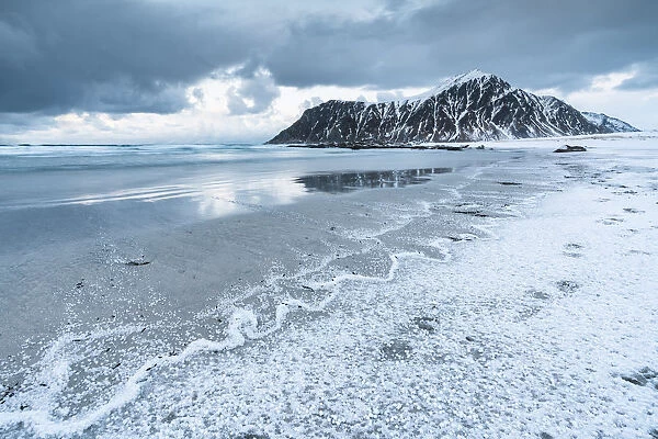 Skagsanden beach after a hailstorm at sunset, Flakstad, Nordland county, Northern Norway