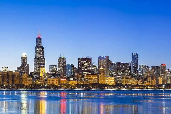 USA, Illinois, Chicago. The City Skyline and a frozen Lake Michigan