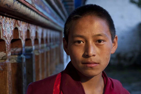 A young monk at the blue palace in Wangdue, Bhutan