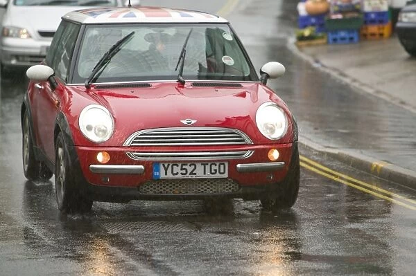 A car driving in the rain in Ambleside UK