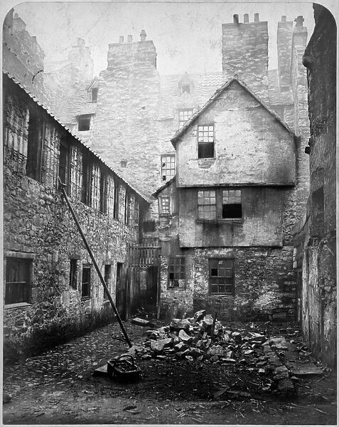 View of houses on East side of College Wynd, Edinburgh, prior to demolition. Date: 1871