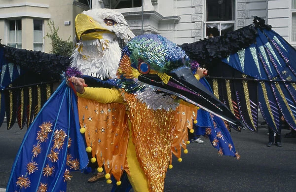 10008634. ENGLAND London Notting Hill Carnival dancers in Eagle and Kingfisher costumes
