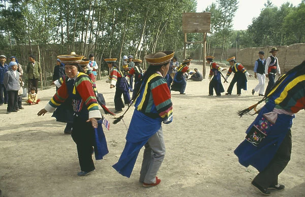 10059372. CHINA Xining Tuzu Girls Dancing at festival in a village