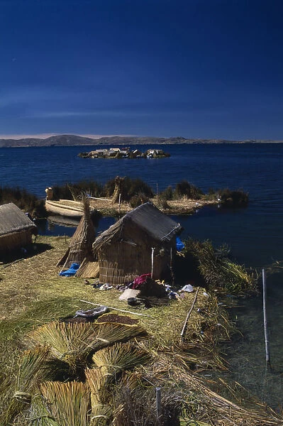 20004626. PERU Puno Lake Titicaca Reed houses on floating islands built by the Uros people