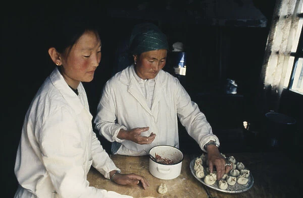 20031501. MONGOLIA People Making Buuz steamed minced lamb dumplings