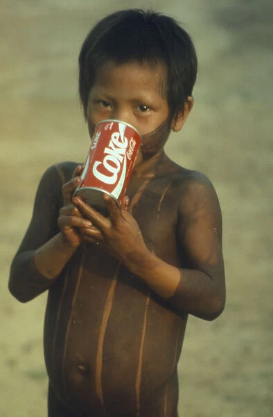 20051931. BRAZIL Para Amazon Kayapo child with can of Coca Cola