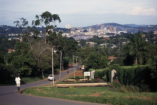 20063938. UGANDA Kampala Wealthy city suburbs with high rise city buildings beyond