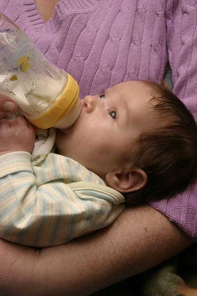 20081491. CHILDREN Babies Birth Kylan Stone infant drinking from baby bottle