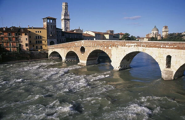 20088293. ITALY Veneto Verona Bridge across the River Adige with city buildings tiled