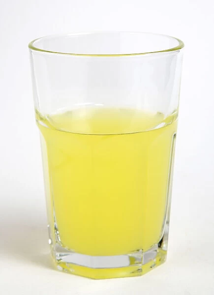 20089144. DRINK Soft Drinks Sugar Soda glass containing yellow coloured soft drink
