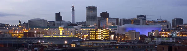 20089708. ENGLAND West Midlands Birmingham City skyline illuminated in evening light