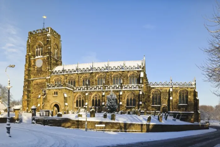 Framed Print : 15th century church in snow on sunny day, St. Marys Church, Thirsk, North Yorkshire, England, January