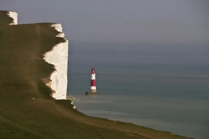 Framed Print : In 1831 construction began on Belle Tout lighthouse on the next headland west from Beachy Head