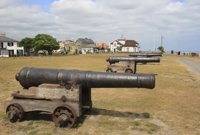 Framed Print : 18th Century 18-pounder guns on seafront of seaside town, Gun Hill, Southwold, Suffolk, England, may