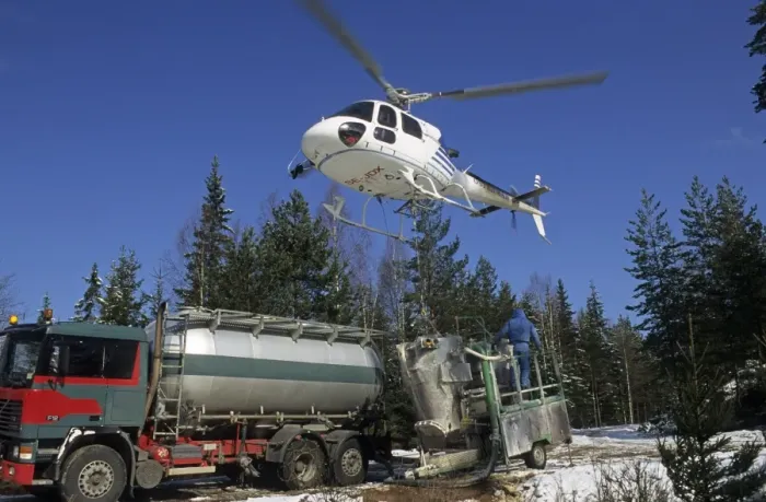 Framed Print : Acid rain, helicopter filling up for lime spreading, to reduce acidity in rivers and wetlands, Sweden Framed Print : Acid rain, helicopter filling up for lime spreading, to reduce acidity in rivers and wetlands, Sweden