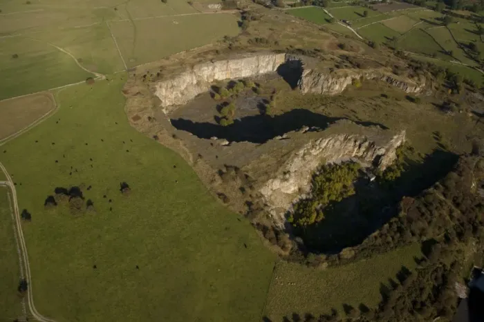 Framed Print : Aerial view of abandoned quarry, White Peak, Peak District, Derbyshire, England, september