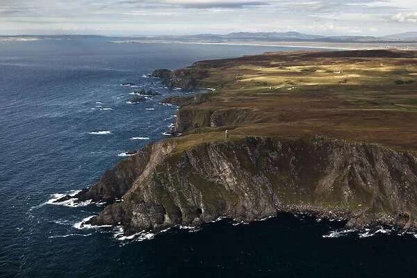 Aerial view of coastline with cliffs and commemorative monument, American Monument, Mull of Oa, Islay, Inner Hebrides