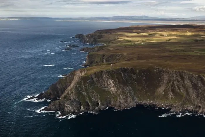 Framed Print : Aerial view of coastline with cliffs and commemorative monument, American Monument, Mull of Oa, Islay, Inner Hebrides