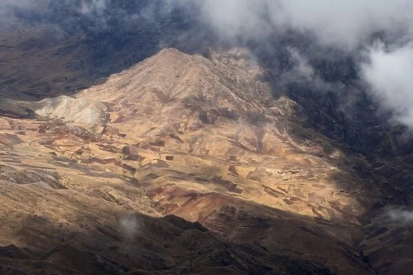 Aerial view of mountains and subsistence farmland in valleys, Andes, Peru, September
