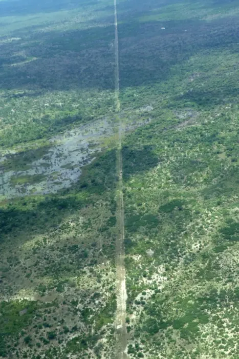 Framed Print : Aerial view of wildlife fence at edge of reserve, Okavango Delta, Botswana Framed Print : Aerial view of wildlife fence at edge of reserve, Okavango Delta, Botswana