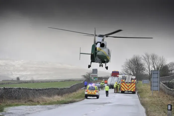Framed Print : Air Ambulance attending road traffic accident in icy weather, Kirkby Stephen, Cumbria, England, December Framed Print : Air Ambulance attending road traffic accident in icy weather, Kirkby Stephen, Cumbria, England, December