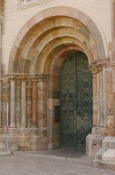 Arched cathedral doorway in historic town, Our Lady Maria Cathedral (Vor Frue Maria Domkirke), Ribe, Jutland, Denmark