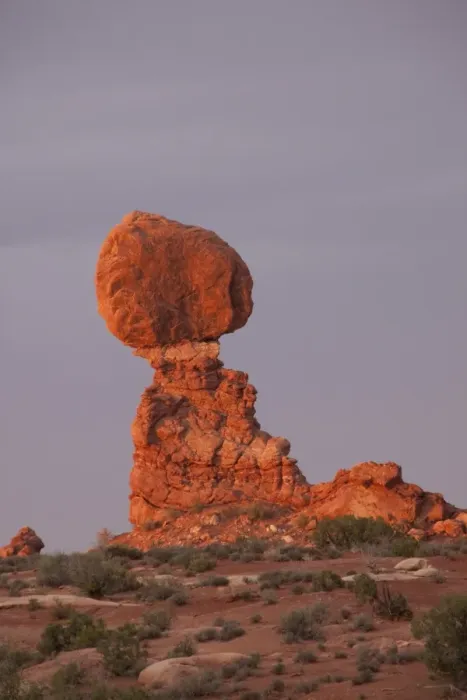 Framed Print : Balanced Rock in the glow of evening light is a defiant 55-foot tall block of Estrada Sandstone that rests on a narrow