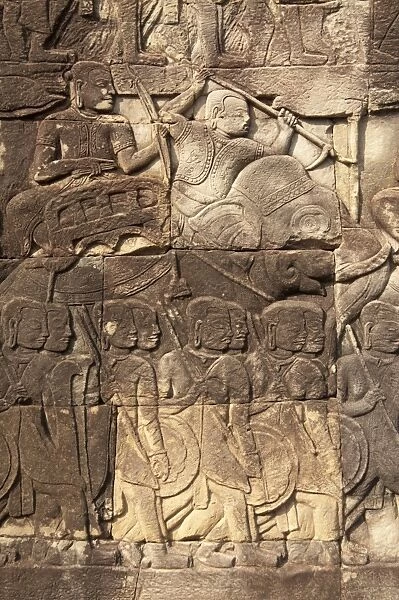 Bas-relief of elephant and soldiers in Khmer templ Bayon, Angkor Thom, Siem Riep, Cambodia