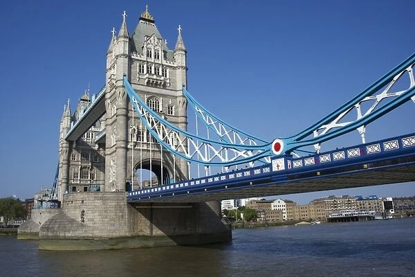 Bascule bridge on river in city, Tower Bridge, River Thames, London, England, april
