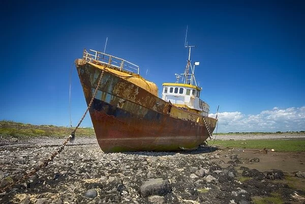 Beached and derelict fishing trawler, Roa Island, Islands of Furness, Barrow-in-Furness, Cumbria, England, July